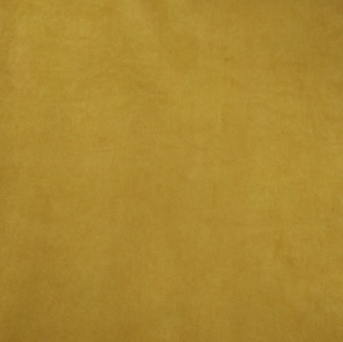 Play mat for kids beside a shelf in a Montessori play corner